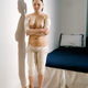 Image for article titled Photos Of Women Hiding After Plastic Surgery Are Disquieting, Poignant